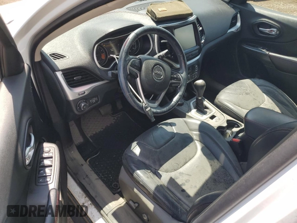 2014 Jeep Cherokee Trailhawk z VIN 1C4PJMBS5EW201897, wystawiony jako Copart lot #57378795 z przebiegiem 172 715 mil mil oraz Szkoda całkowita • Salvage title. Historia ofert i sprzedaży dostępna na DreamBid. Obrazek 8.