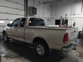 1999 Ford F-150 with VIN 1FTRX18W0XKA68363, listed as a IAAI auction lot 41524104 with 218,400 mi miles and . Bid and sale history available at DreamBid. Image 15.