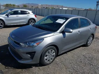 2023 Kia Rio S with VIN 3KPA24AD5PE524320, listed as a IAAI auction lot 41881897 with 48,615 mi miles. Bid and sale history available at carsss.com. Image 2.