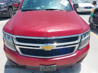 2015 Chevrolet Tahoe LS with VIN 1GNSCAEC4FR121571, listed as a IAAI auction lot 42499156 with 131,284 mi miles and . Bid and sale history available at DreamBid. Image 6.