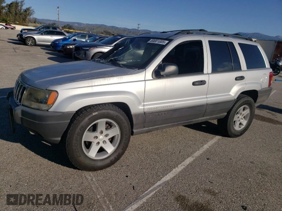 2003 Jeep Grand Cherokee Laredo with VIN 1J4GX48S63C523513, listed as a Copart auction lot 50001005 with 0 mi miles and Salvage Title. Bid and sale history available at carsss.com. Image 1.