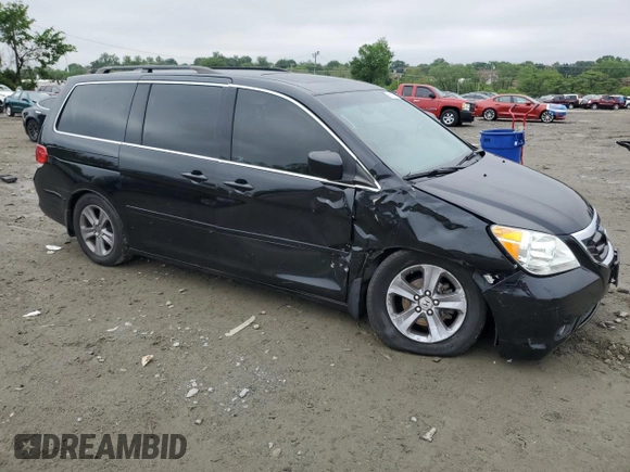 2008 Honda Odyssey Touring z VIN 5FNRL38968B014503, wystawiony jako Copart lot #56817625 z przebiegiem Nie podano mil oraz Szkoda całkowita • Salvage title. Historia ofert i sprzedaży dostępna na DreamBid. Obrazek 4.