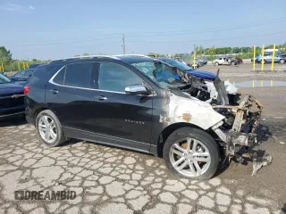 2019 Chevrolet Equinox Premier z VIN 3GNAXYEX9KL399167, wystawiony jako Copart lot #57021775 z przebiegiem Nie podano mil oraz Szkoda całkowita • Salvage title. Historia ofert i sprzedaży dostępna na DreamBid. Obrazek 4.