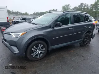 2018 Toyota RAV4 LE with VIN 2T3BFREV8JW850391, listed as a IAAI auction lot 42487413 with 66,866 mi miles and . Bid and sale history available at DreamBid. Image 2.