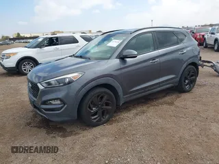 2016 Hyundai Tucson Eco with VIN KM8J3CA28GU217033, listed as a IAAI auction lot 41476238 with 76,311 mi miles. Bid and sale history available at carsss.com. Image 18.