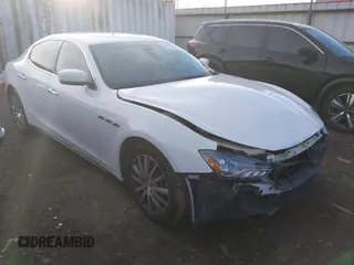 2014 Maserati Ghibli S Q4 z VIN ZAM57RTA1E1096387, wystawiony jako IAAI lot #41424049 z przebiegiem 100 970 mil mil oraz . Historia ofert i sprzedaży dostępna na DreamBid. Obrazek 1.