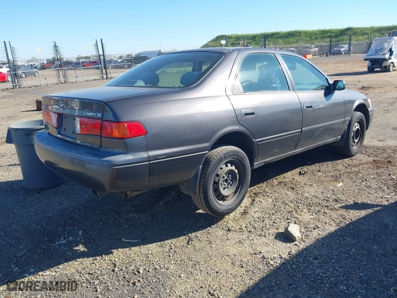 2000 Toyota Camry CE with VIN JT2BG22K7Y0501602, listed as a IAAI auction lot 41841064 with 236,611 mi miles. Bid and sale history available at carsss.com. Image 4.