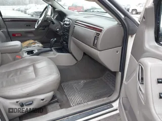 2002 Jeep Grand Cherokee Limited with VIN 1J8GX58N42C283956, listed as a IAAI auction lot 41553997 with 214,388 mi miles and . Bid and sale history available at DreamBid. Image 5.