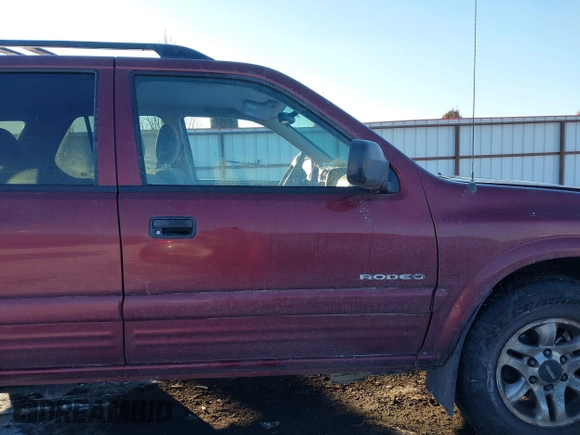 2002 Isuzu Rodeo z VIN 4S2DM58W124319936, wystawiony jako IAAI lot #41555285 z przebiegiem 143 035 mil mil oraz . Historia ofert i sprzedaży dostępna na DreamBid. Obrazek 13.