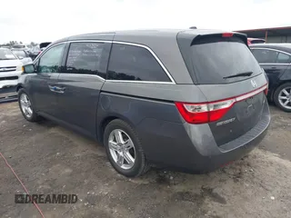 2012 Honda Odyssey Touring with VIN 5FNRL5H99CB071010, listed as a IAAI auction lot 41651233 with 186,913 mi miles. Bid and sale history available at carsss.com. Image 3.