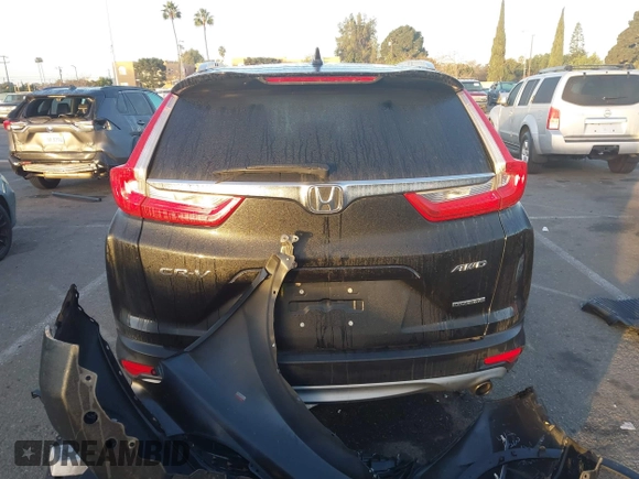 2019 Honda CR-V Touring with VIN 7FARW2H9XKE012394, listed as a IAAI auction lot 41092564 with 49,527 mi miles and . Bid and sale history available at DreamBid. Image 16.