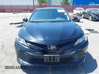 2020 Toyota Camry LE with VIN 4T1C11AKXLU955851, listed as a IAAI auction lot 41996827 with 59,008 mi miles and . Bid and sale history available at carsss.com. Image 13.