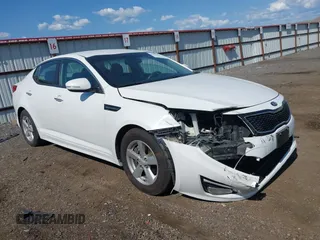 2015 Kia Optima LX z VIN KNAGM4A74F5527506, wystawiony jako IAAI lot #42429473 z przebiegiem 146 282 mil mil oraz . Historia ofert i sprzedaży dostępna na DreamBid. Obrazek 1.