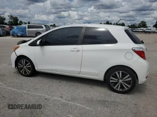 2014 Toyota Yaris L with VIN VNKJTUD37EA008192, listed as a Copart auction lot 70955594 with 129,486 mi miles and Salvage Title. Bid and sale history available at carsss.com. Image 2.