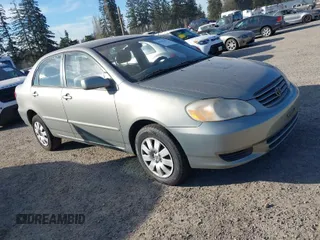 2004 Toyota Corolla CE with VIN JTDBR38E842043849, listed as a IAAI auction lot 41703290 with 299,999 mi miles. Bid and sale history available at carsss.com. Image 1.