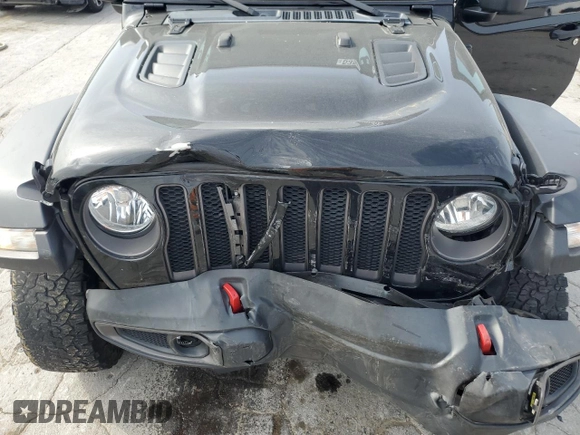 2021 Jeep Wrangler Rubicon with VIN 1C4HJXCG5MW797267, listed as a Copart auction lot 53585825 with 44,496 mi miles and Salvage title. Bid and sale history available at DreamBid. Image 12.