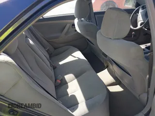 2009 Toyota Camry with VIN 4T1BE46KX9U879566, listed as a IAAI auction lot 42020660 with 207,291 mi miles. Bid and sale history available at carsss.com. Image 8.