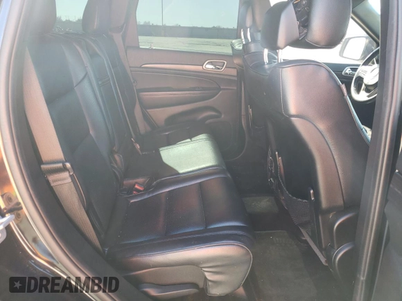 2014 Jeep Grand Cherokee Laredo with VIN 1C4RJEAGXEC217249, listed as a Copart auction lot 48585195 with 131,635 mi miles and Salvage Title. Bid and sale history available at DreamBid. Image 11.