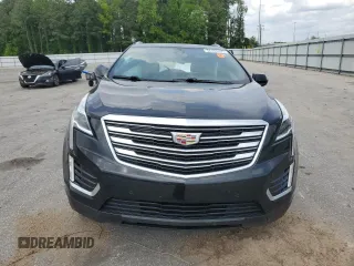 2018 Cadillac XT5 Premium Luxury FWD z VIN 1GYKNERS9JZ234513, wystawiony jako Copart lot #54105735 z przebiegiem 127 345 mil mil oraz Szkoda całkowita • Salvage title. Historia ofert i sprzedaży dostępna na DreamBid. Obrazek 5.