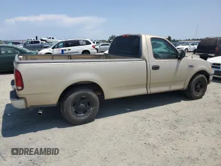 2000 Ford F-150 XL with VIN 1FTZF172XYNB65958, listed as a Copart auction lot 59946145 with 208,988 mi miles and Salvage title. Bid and sale history available at DreamBid. Image 3.