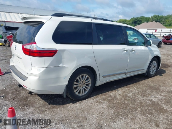2016 Toyota Sienna XLE with VIN 5TDYK3DC4GS748888, listed as a IAAI auction lot 42605968 with 164,811 mi miles and . Bid and sale history available at DreamBid. Image 4.
