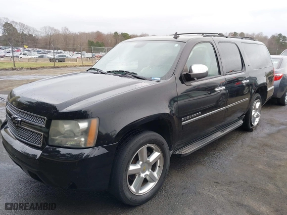 2011 Chevrolet Suburban LTZ with VIN 1GNSCKE02BR206544, listed as a IAAI auction lot 41159341 with 218,202 mi miles. Bid and sale history available at carsss.com. Image 17.
