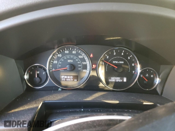 2008 Jeep Commander Sport z VIN 1J8HH48KX8C105432, wystawiony jako Copart lot #86000854 z przebiegiem 201 869 mil mil oraz Szkoda całkowita • Salvage title. Historia ofert i sprzedaży dostępna na DreamBid. Obrazek 9.