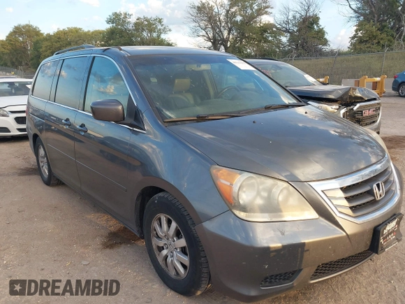 2010 Honda Odyssey EX-L with VIN 5FNRL3H70AB074913, listed as a IAAI auction lot 40142162 with 210,771 mi miles and . Bid and sale history available at DreamBid. Image 1.