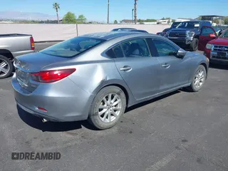 2014 Mazda 6 i Sport with VIN JM1GJ1U61E1151348, listed as a IAAI auction lot 42248173 with 275,764 mi miles and . Bid and sale history available at DreamBid. Image 4.