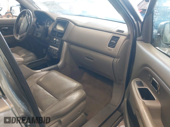 2006 Honda Pilot EX-L with VIN 5FNYF187X6B026463, listed as a IAAI auction lot 41612181 with 242,828 mi miles and . Bid and sale history available at DreamBid. Image 5.