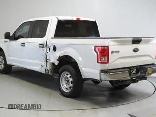 2015 Ford F-150 XL with VIN 1FTEW1CG0FKD61342, listed as a Copart auction lot 60142545 with 113,798 mi miles and Salvage title. Bid and sale history available at DreamBid. Image 4.
