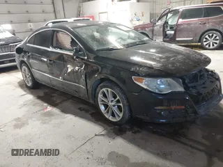 2009 Volkswagen CC Luxury with VIN WVWHL73C09E515699, listed as a IAAI auction lot 41596349 with 143,570 mi miles. Bid and sale history available at carsss.com. Image 1.