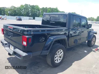 2023 Jeep Gladiator Sport S with VIN 1C6HJTAGXPL543319, listed as a IAAI auction lot 42499587 with 45,140 mi miles and . Bid and sale history available at DreamBid. Image 4.