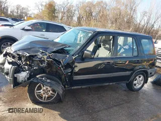 1998 Honda CR-V EX with VIN JHLRD1864WC090547, listed as a IAAI auction lot 40978428 with 315,650 mi miles. Bid and sale history available at carsss.com. Image 13.
