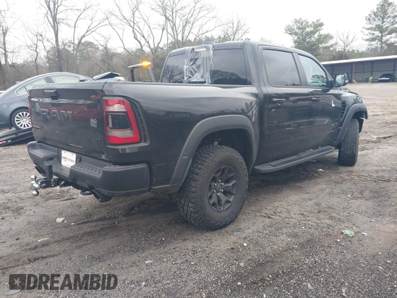 2022 Ram 1500 TRX with VIN 1C6SRFU9XNN476106, listed as a IAAI auction lot 41627895 with 21,992 mi miles and . Bid and sale history available at DreamBid. Image 4.