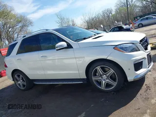 2015 Mercedes-Benz M 63 AMG with VIN 4JGDA7EB6FA471585, listed as a IAAI auction lot 41883006 with 39,243 mi miles and . Bid and sale history available at carsss.com. Image 13.