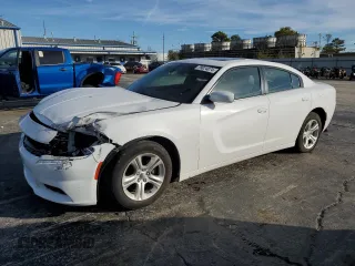2020 Dodge Charger SXT with VIN 2C3CDXBG2LH237226, listed as a Copart auction lot 79824874 with 96,390 mi miles and Salvage Title. Bid and sale history available at carsss.com. Image 1.
