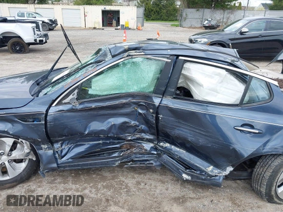 2015 Kia Optima with VIN KNAGM4AD4F5087986, listed as a IAAI auction lot 42037820 with 82,120 mi miles and . Bid and sale history available at DreamBid. Image 6.