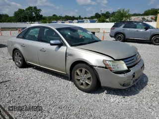 2008 Ford Taurus Limited with VIN 1FAHP25W58G151934, listed as a Copart auction lot 60219925 with 222,592 mi miles and Salvage title. Bid and sale history available at DreamBid. Image 4.