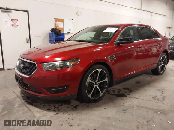 2014 Ford Taurus SHO with VIN 1FAHP2KT9EG130834, listed as a IAAI auction lot 41748199 with 98,857 mi miles and . Bid and sale history available at carsss.com. Image 2.