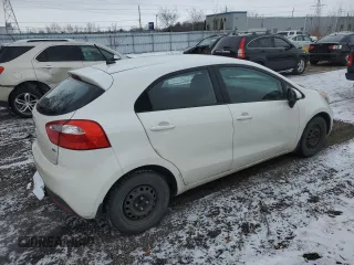 2014 Kia Rio LX with VIN KNADM5A35E6921756, listed as a Copart auction lot 84653184 with 181,703 mi miles and Salvage Title. Bid and sale history available at carsss.com. Image 3.