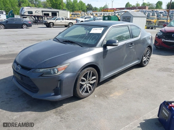 2015 Scion tC with VIN JTKJF5C71FJ013747, listed as a IAAI auction lot 42087740 with 138,097 mi miles. Bid and sale history available at carsss.com. Image 17.