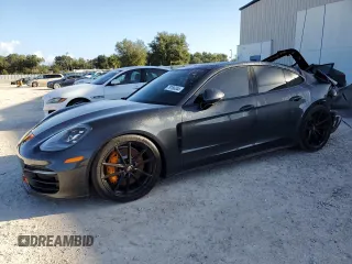 2021 Porsche Panamera с VIN WP0AJ2A76ML120026, выставлен на аукционе Copart как лот 79166344 с пробегом 71 176 миль миль и Списание • Salvage title. История ставок и продаж доступна на DreamBid. Изображение 1.