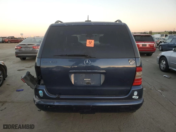 2001 Mercedes-Benz M-Class with VIN 4JGAB72E91A260677, listed as a Copart auction lot 89200235 with 180,414 mi miles and Salvage Title. Bid and sale history available at carsss.com. Image 6.