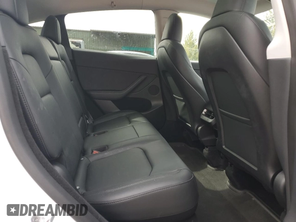 2023 Tesla Model Y Long Range with VIN 7SAYGDEE6PA101291, listed as a Copart auction lot 52758115 with 7,250 mi miles and Salvage Title. Bid and sale history available at DreamBid. Image 11.