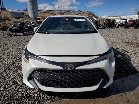 2019 Toyota Corolla Hatchback SE with VIN JTNK4RBE7K3005297, listed as a Copart auction lot 48137475 with 0 mi miles and Salvage Title. Bid and sale history available at carsss.com. Image 5.