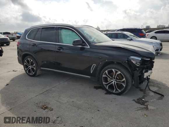 2021 BMW X5 sDrive40i z VIN 5UXCR4C00M9E01511, wystawiony jako Copart lot #54236305 z przebiegiem Nie podano mil oraz Szkoda całkowita • Salvage title. Historia ofert i sprzedaży dostępna na DreamBid. Obrazek 4.