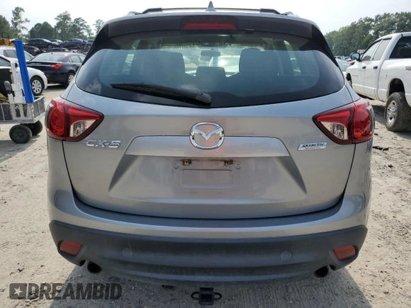 2015 Mazda CX-5 Sport with VIN JM3KE2BE4F0533273, listed as a Copart auction lot 60307795 with 120,484 mi miles and Salvage title. Bid and sale history available at DreamBid. Image 6.