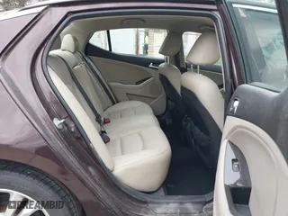 2013 Kia Optima EX with VIN 5XXGN4A79DG240428, listed as a IAAI auction lot 42017665 with 94,765 mi miles. Bid and sale history available at carsss.com. Image 8.