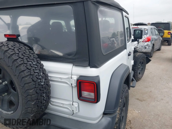 2018 Jeep Wrangler Sport with VIN 1C4GJXAG4JW307122, listed as a IAAI auction lot 41925899 with 94,740 mi miles and . Bid and sale history available at DreamBid. Image 4.